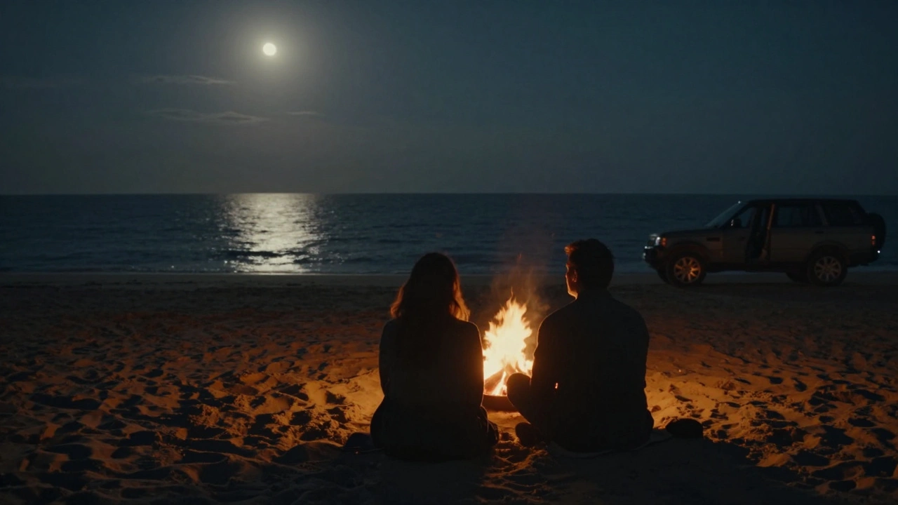 A silent beach at dawn, a man and woman beside a fire pit, a Range Rover waiting in the distance under moonlight.